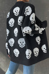 Shop Halloween Skull Print Knit Cardigan-Cozy, Bold & Spooky-Chic Add a bold, seasonal twist to your layers with the Halloween Skull Print Knit Cardigan — a must-have for spooky season lovers. -available at Reef Love online boho-chic boutique
