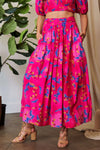 Hot Pink Smocking Waistband Ruffled Maxi Skirt-Hot pink floral maxi skirt with pockets, A-line silhouette, and elastic waist. Lightweight and bold — perfect for summer, brunch, or vacation style.-Reef Love Boho-Chic Boutique