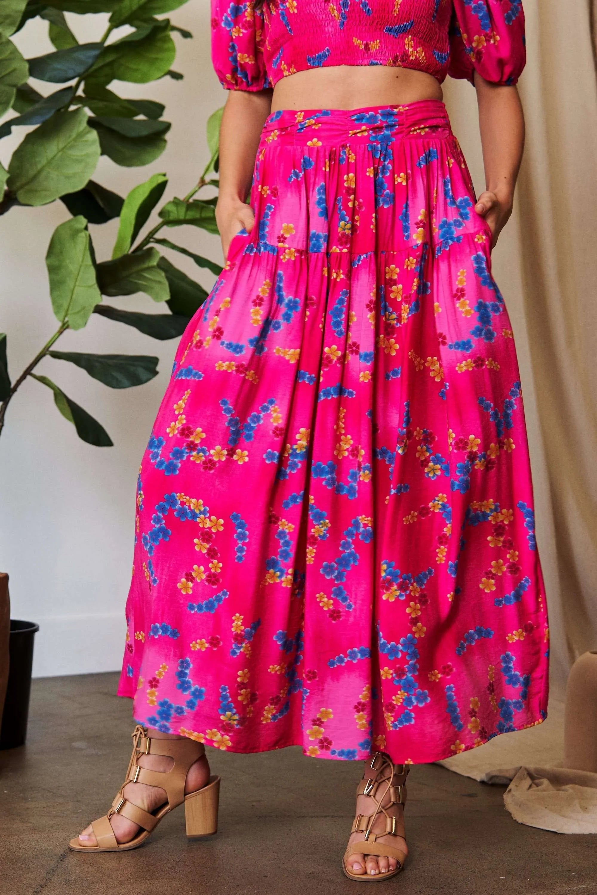 Hot Pink Smocking Waistband Ruffled Maxi Skirt-Hot pink floral maxi skirt with pockets, A-line silhouette, and elastic waist. Lightweight and bold — perfect for summer, brunch, or vacation style.-Reef Love Boho-Chic Boutique