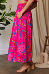 Hot Pink Smocking Waistband Ruffled Maxi Skirt-Hot pink floral maxi skirt with pockets, A-line silhouette, and elastic waist. Lightweight and bold — perfect for summer, brunch, or vacation style.-Reef Love Boho-Chic Boutique