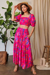 Hot Pink Smocking Waistband Ruffled Maxi Skirt-Hot pink floral maxi skirt with pockets, A-line silhouette, and elastic waist. Lightweight and bold — perfect for summer, brunch, or vacation style.-Reef Love Boho-Chic Boutique