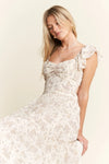 Ivory Ruffle Sleeve Tiered Maxi Dress-Effortlessly romantic and undeniably elegant, this tiered maxi dress is made for sun-drenched days and dreamy evenings. Featuring a delicate floral print-Reef Love Boho-Chic Boutique