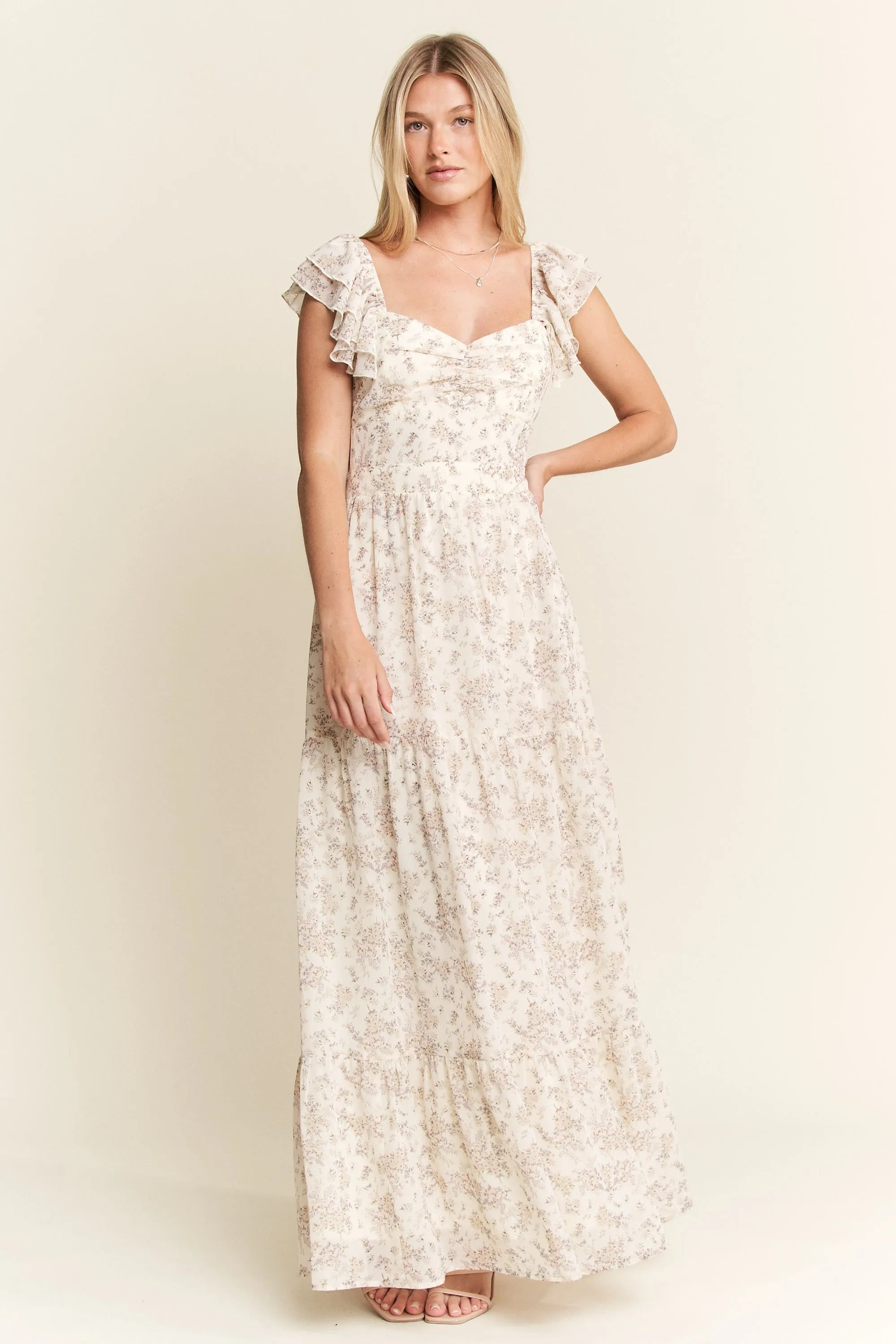 Ivory Ruffle Sleeve Tiered Maxi Dress-Effortlessly romantic and undeniably elegant, this tiered maxi dress is made for sun-drenched days and dreamy evenings. Featuring a delicate floral print-Reef Love Boho-Chic Boutique