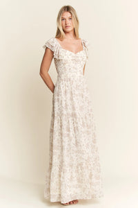 Ivory Ruffle Sleeve Tiered Maxi Dress-Effortlessly romantic and undeniably elegant, this tiered maxi dress is made for sun-drenched days and dreamy evenings. Featuring a delicate floral print-Reef Love Boho-Chic Boutique