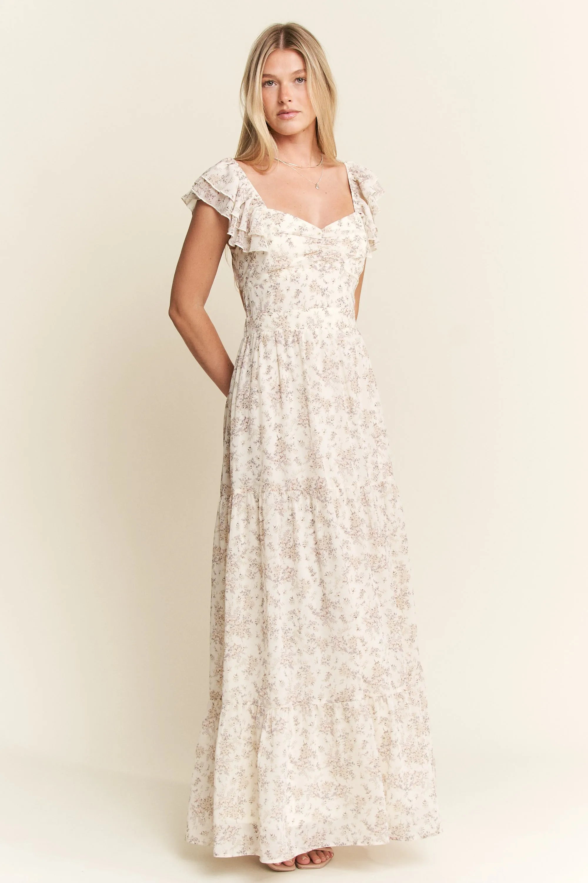 Ivory Ruffle Sleeve Tiered Maxi Dress-Effortlessly romantic and undeniably elegant, this tiered maxi dress is made for sun-drenched days and dreamy evenings. Featuring a delicate floral print-Reef Love Boho-Chic Boutique