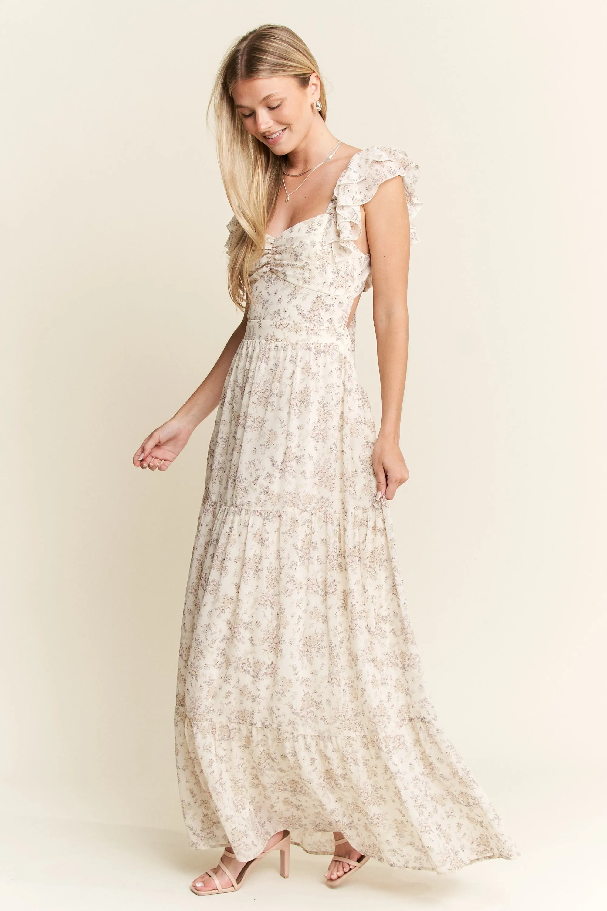 Ivory Ruffle Sleeve Tiered Maxi Dress-Effortlessly romantic and undeniably elegant, this tiered maxi dress is made for sun-drenched days and dreamy evenings. Featuring a delicate floral print-Reef Love Boho-Chic Boutique