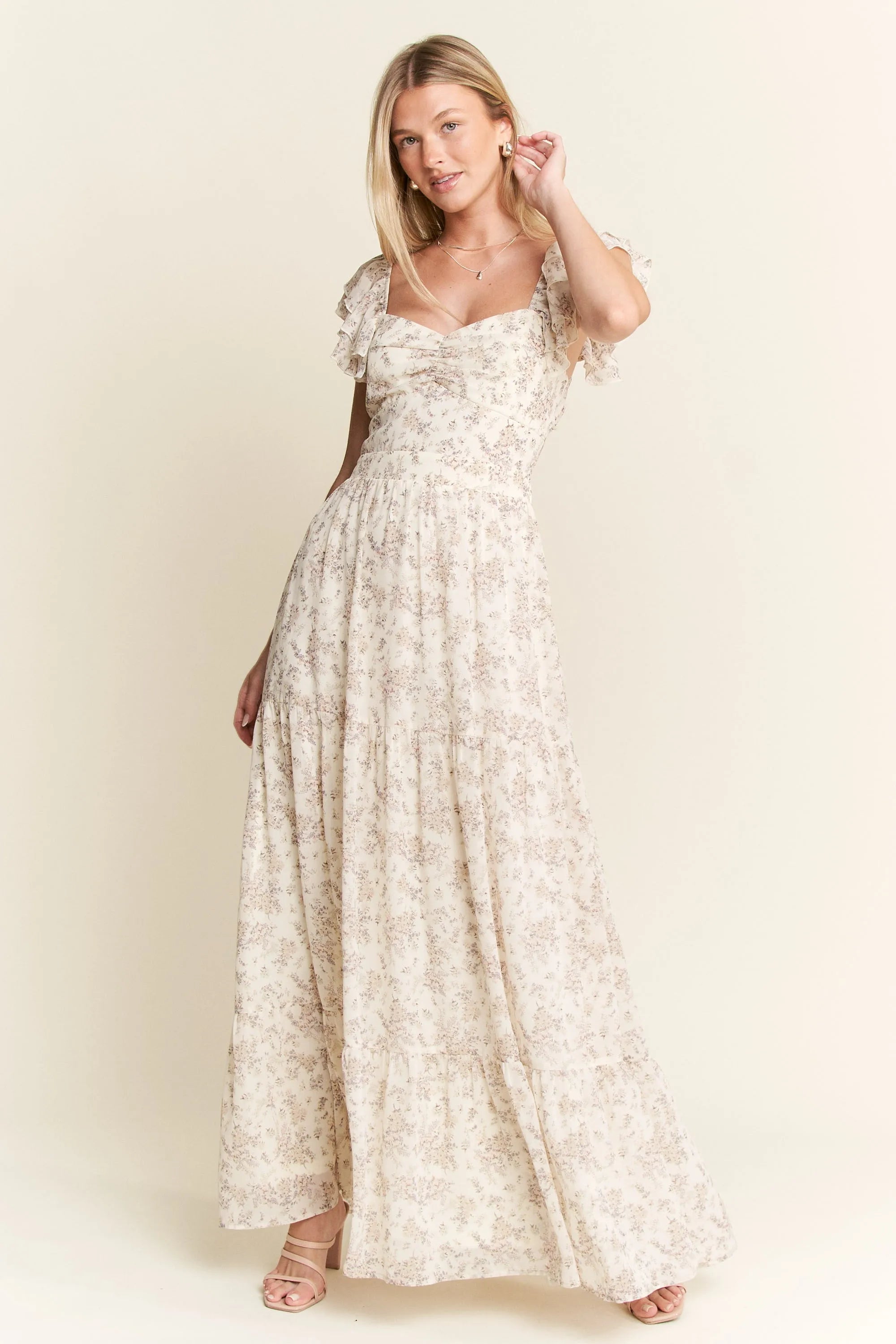 Ivory Ruffle Sleeve Tiered Maxi Dress-Effortlessly romantic and undeniably elegant, this tiered maxi dress is made for sun-drenched days and dreamy evenings. Featuring a delicate floral print-Reef Love Boho-Chic Boutique