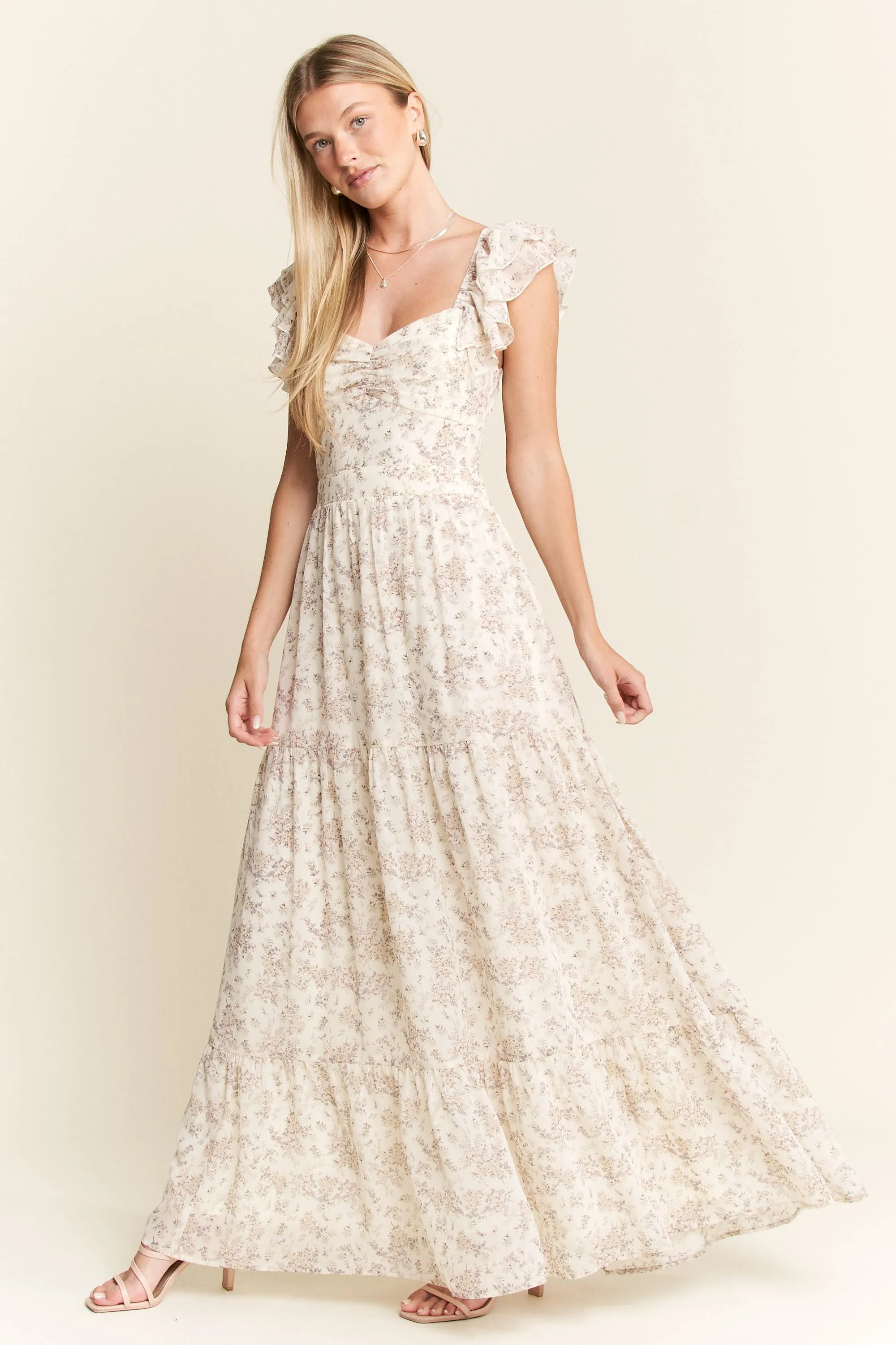 Ivory Ruffle Sleeve Tiered Maxi Dress-Effortlessly romantic and undeniably elegant, this tiered maxi dress is made for sun-drenched days and dreamy evenings. Featuring a delicate floral print-Reef Love Boho-Chic Boutique