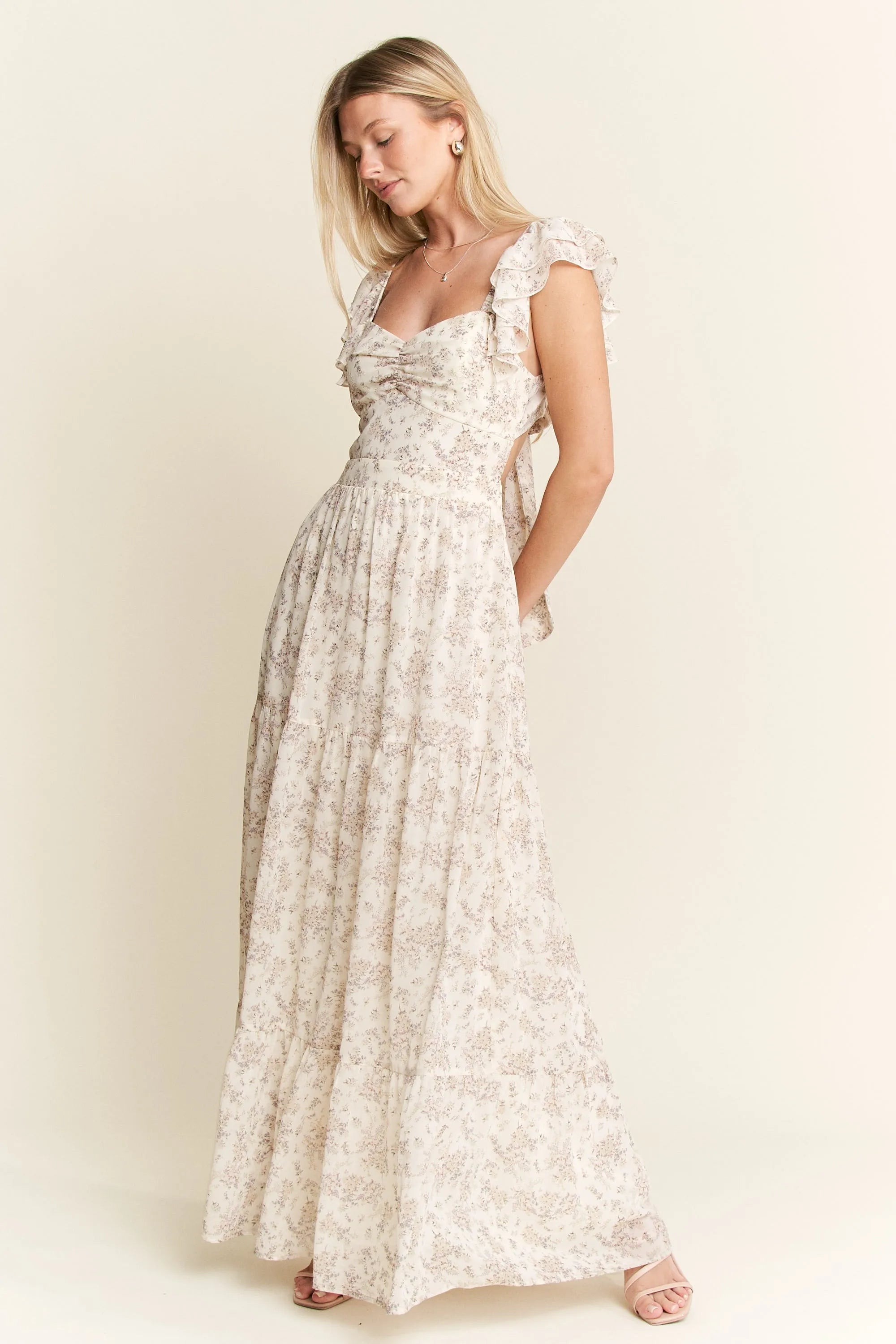 Ivory Ruffle Sleeve Tiered Maxi Dress-Effortlessly romantic and undeniably elegant, this tiered maxi dress is made for sun-drenched days and dreamy evenings. Featuring a delicate floral print-Reef Love Boho-Chic Boutique