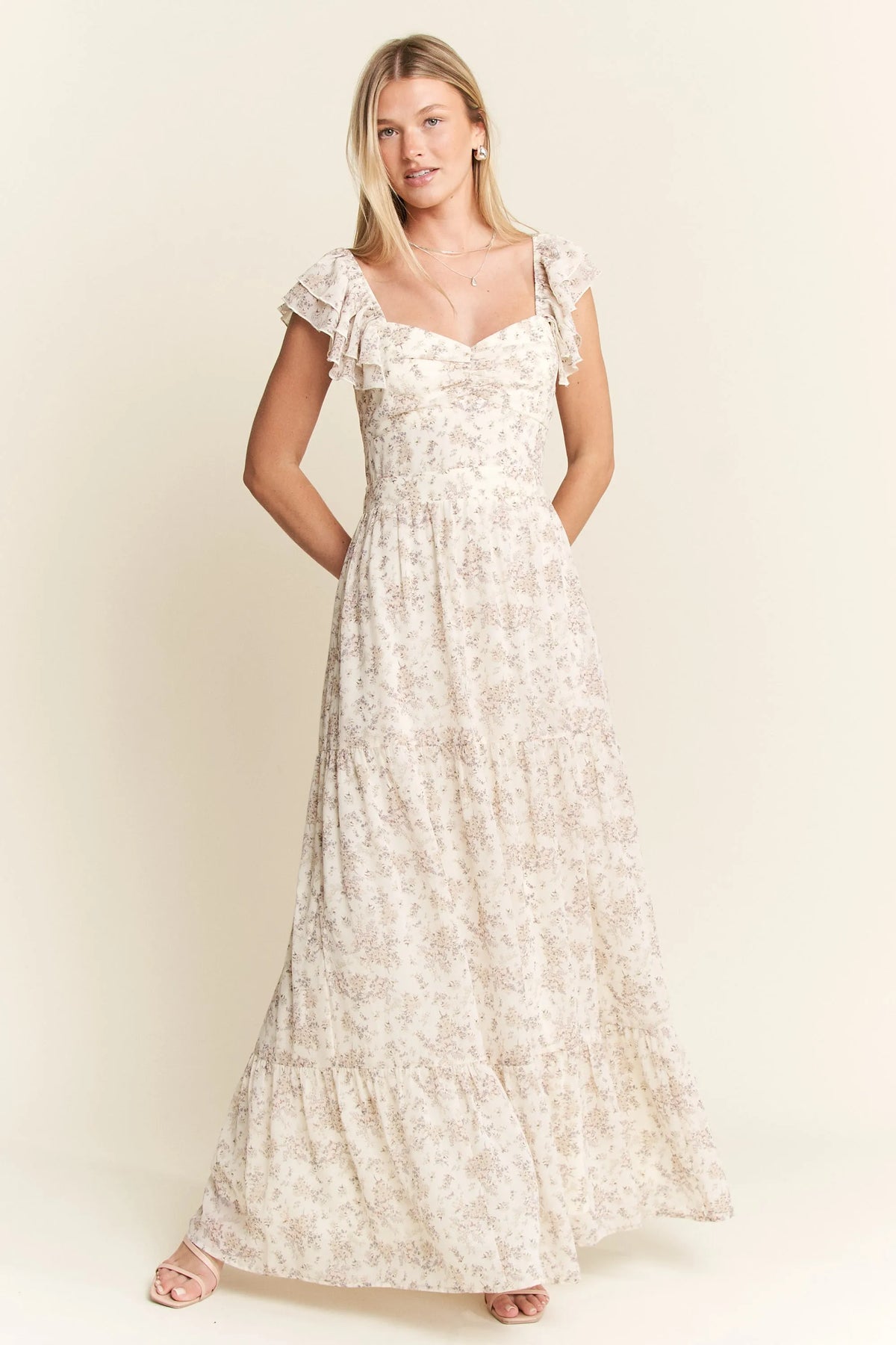 Ivory Ruffle Sleeve Tiered Maxi Dress-Effortlessly romantic and undeniably elegant, this tiered maxi dress is made for sun-drenched days and dreamy evenings. Featuring a delicate floral print-Reef Love Boho-Chic Boutique
