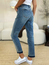Judy Blue Mid Rise Rigid Magic Release Hem Jeans-Judy Blue Mid Rise Rigid Magic Release Hem Jeans with structured fit + stretch comfort. Trendy release hem. Available in standard & plus sizes.