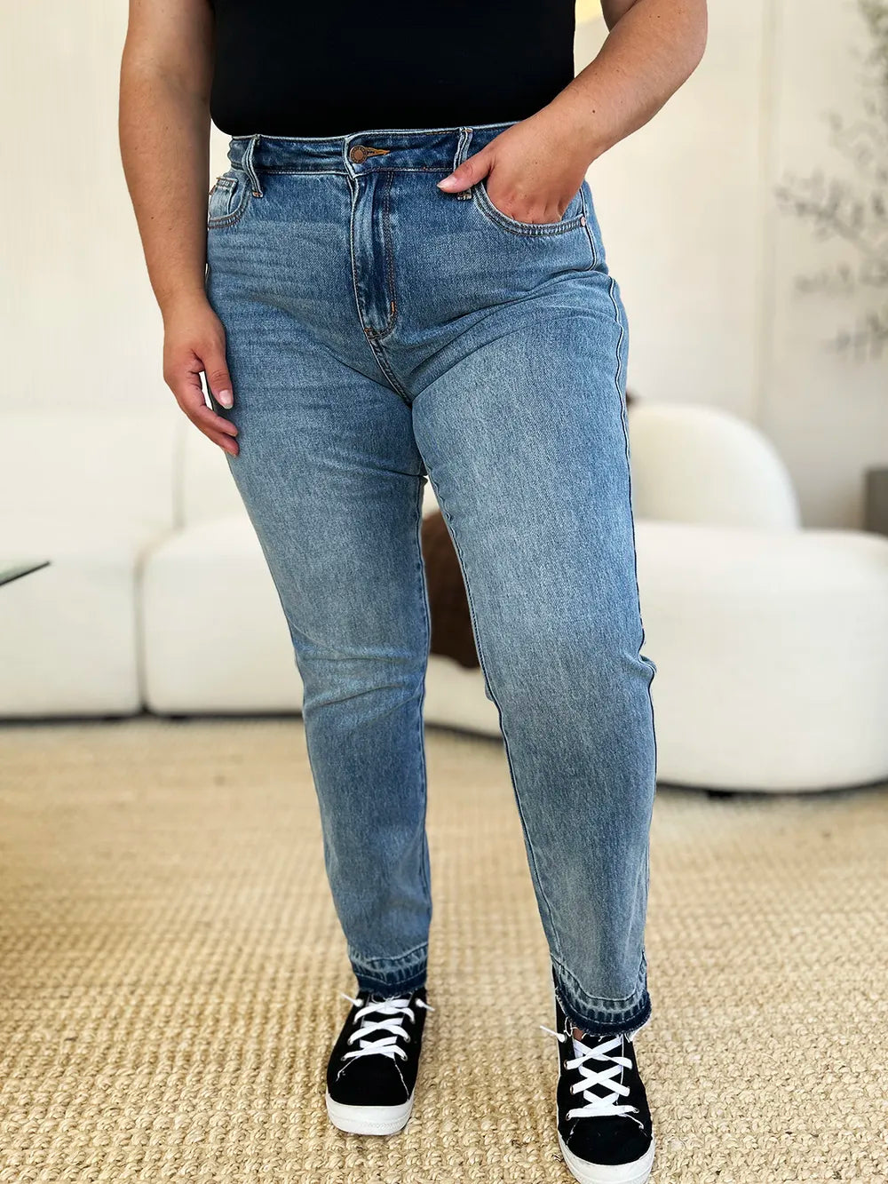 Judy Blue Mid Rise Rigid Magic Release Hem Jeans-Judy Blue Mid Rise Rigid Magic Release Hem Jeans with structured fit + stretch comfort. Trendy release hem. Available in standard & plus sizes.