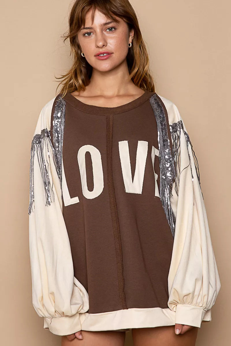 LOVE French Terry Sweatshirt with Sequin Tassel-LOVE balloon sleeve sweatshirt with sequin tassels. French terry pullover with exposed seams, cozy fit, and sparkling LOVE detail for casual chic style.-Reef Love