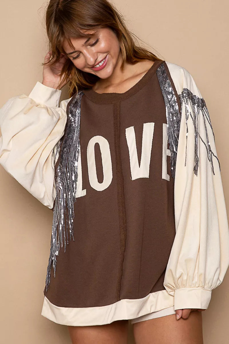 LOVE French Terry Sweatshirt with Sequin Tassel-LOVE balloon sleeve sweatshirt with sequin tassels. French terry pullover with exposed seams, cozy fit, and sparkling LOVE detail for casual chic style.-Reef Love