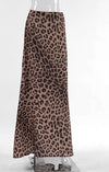 Leopard Print Maxi Skirt-Leopard print maxi skirt with high waist and A-line silhouette. Flowy, chic boho style perfect for casual wear, vacation outfits, or evening looks.