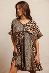 Leopard Print Mix and Match Mini Dress-Leopard Print Mix & Match Mini Dress, featuring a mix of leopard prints in rich, earthy tones. Designed with a V-neckline, flutter sleeves, and an empire waist.-Reef Love Boho-Chic Boutique