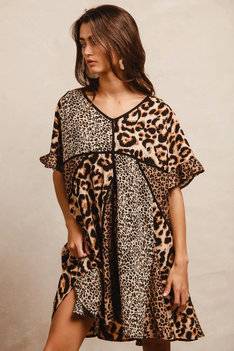 Leopard Print Mix and Match Mini Dress-Leopard Print Mix & Match Mini Dress, featuring a mix of leopard prints in rich, earthy tones. Designed with a V-neckline, flutter sleeves, and an empire waist.-Reef Love Boho-Chic Boutique