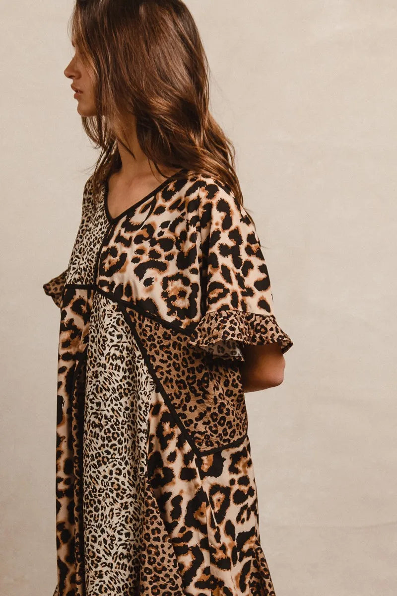 Leopard Print Mix and Match Mini Dress-Leopard Print Mix & Match Mini Dress, featuring a mix of leopard prints in rich, earthy tones. Designed with a V-neckline, flutter sleeves, and an empire waist.-Reef Love Boho-Chic Boutique