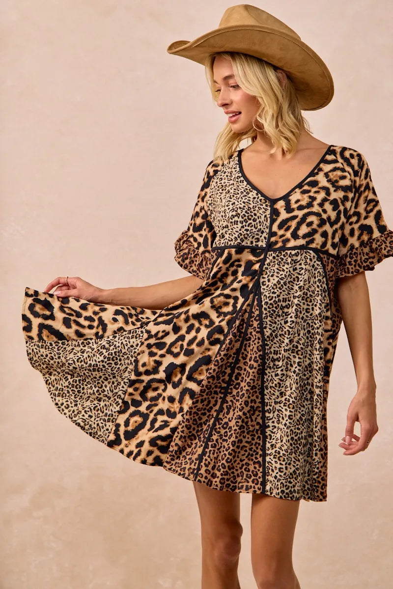 Leopard Print Mix and Match Mini Dress-Leopard Print Mix & Match Mini Dress, featuring a mix of leopard prints in rich, earthy tones. Designed with a V-neckline, flutter sleeves, and an empire waist.-Reef Love Boho-Chic Boutique