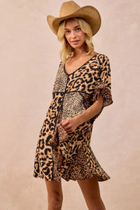 Leopard Print Mix and Match Mini Dress-Leopard Print Mix & Match Mini Dress, featuring a mix of leopard prints in rich, earthy tones. Designed with a V-neckline, flutter sleeves, and an empire waist.-Reef Love Boho-Chic Boutique