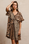 Leopard Print Mix and Match Mini Dress-Leopard Print Mix & Match Mini Dress, featuring a mix of leopard prints in rich, earthy tones. Designed with a V-neckline, flutter sleeves, and an empire waist.-Reef Love Boho-Chic Boutique