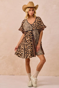 Leopard Print Mix and Match Mini Dress-Leopard Print Mix & Match Mini Dress, featuring a mix of leopard prints in rich, earthy tones. Designed with a V-neckline, flutter sleeves, and an empire waist.-Reef Love Boho-Chic Boutique