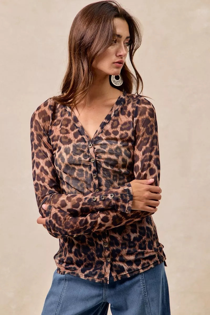 Leopard Printed Mesh Shirt-Make a bold statement with this Leopard Printed Mesh Top featuring a Button-Up V Neck design. The leopard print adds a touch of wild sophistication to your outfit