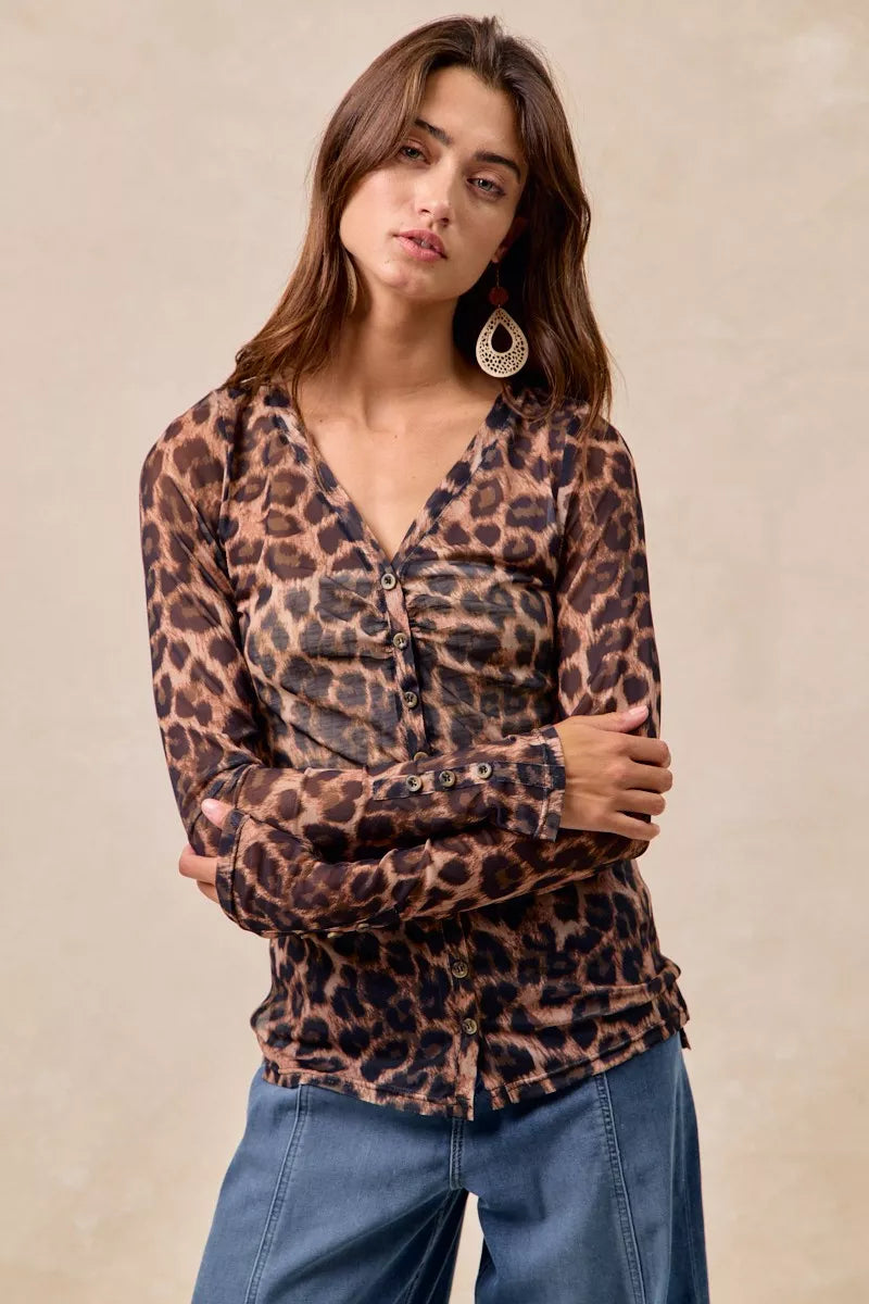 Leopard Printed Mesh Shirt-Make a bold statement with this Leopard Printed Mesh Top featuring a Button-Up V Neck design. The leopard print adds a touch of wild sophistication to your outfit