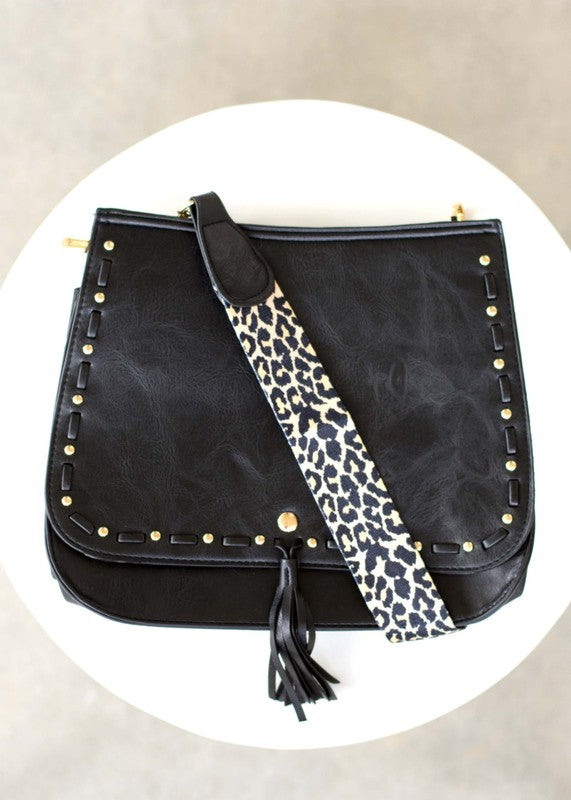Leopard Strap Fold-over black Crossbody Bag-Vegan leather crossbody with leopard strap, snap + zipper closures, and pockets.