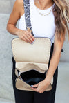 Leopard Strap Fold-over Crossbody Bag-Vegan leather crossbody with leopard strap, snap + zipper closures, and pockets.