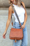 Leopard Strap Fold-over Crossbody Bag-Vegan leather crossbody with leopard strap, snap + zipper closures, and pockets.