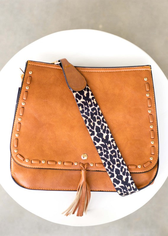Leopard Strap Fold-over brown Crossbody Bag-Vegan leather crossbody with leopard strap, snap + zipper closures, and pockets.