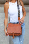 Leopard Strap Fold-over Crossbody Bag-Vegan leather crossbody with leopard strap, snap + zipper closures, and pockets.