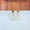 Shop Lexi Earrings - Gold Foil-Clear acrylic statement earrings with gold foil specks and hypoallergenic gold-plated posts. Lightweight glam perfect for day-to-night, minimalist, or elegant looks.-available at Reef Love online boho-chic boutique