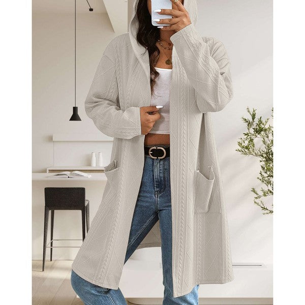 Long Cable Knitted Open Front Cardigan with Hood-Stay cozy and stylish this fall and winter in our Long Cable Knit Hooded Cardigan. Chunky, soft, and versatile with pockets – perfect for layering all season.