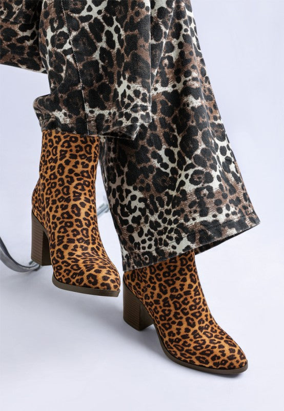 Lunara Leopard Print Block Heel Boots-Lunara leopard print block heel boots by London Rag. Chic microfiber ankle boots with 3" stacked heel, almond toe & cushioned insoles. Bold statement style.