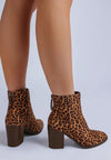 Lunara Leopard Print Block Heel Boots-Lunara leopard print block heel boots by London Rag. Chic microfiber ankle boots with 3" stacked heel, almond toe & cushioned insoles. Bold statement style.