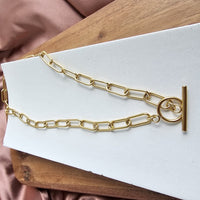 Shop Luxe Gold Chunky Paperclip Chain Necklace, Tarnish-Resistant, 18"-18" chunky paperclip chain necklace in 18k gold-plated stainless steel. Tarnish-resistant, waterproof, and hypoallergenic—perfect for layering or solo shine.-available at Reef Love online boho-chic boutique