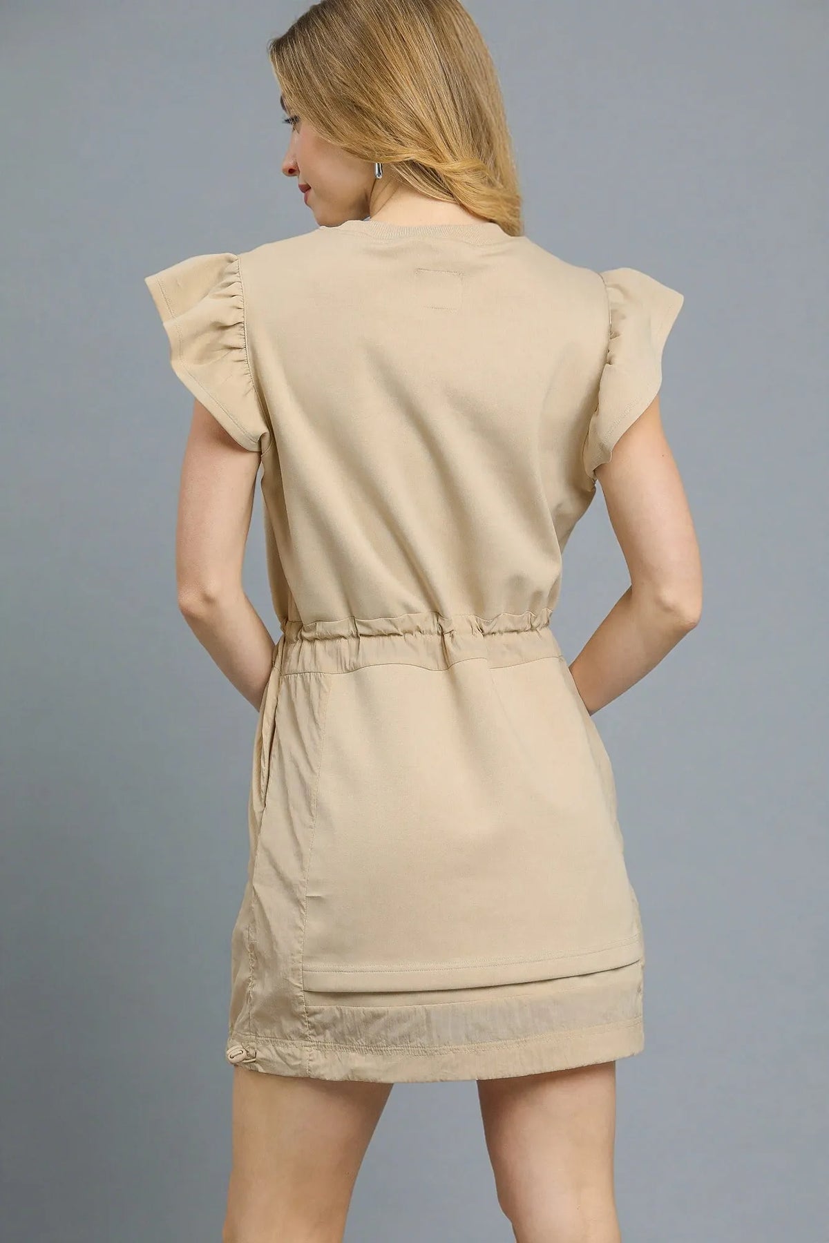 Luxe Knit Drawstring Mini Dress-Ruffle sleeve mini dress is a versatile staple for any wardrobe. Featuring charming cap sleeves with ruffle detailing, it adds a soft, modern silhouette.-Reef Love Boho-Chic Boutique