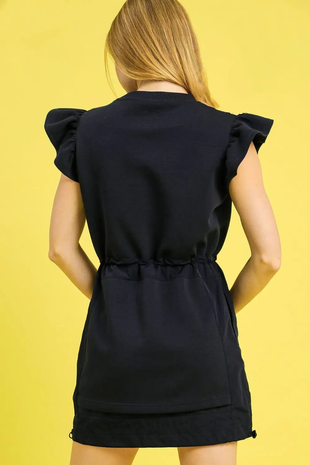 Luxe knit Ruffle Sleeve Drawstring Mini Dress, Navy-This stylish black mini dress features charming ruffle cap sleeves that add a feminine touch to your casual wardrobe. Made from comfortable cotton blend fabric.-Reef Love Boho-Chic Boutique