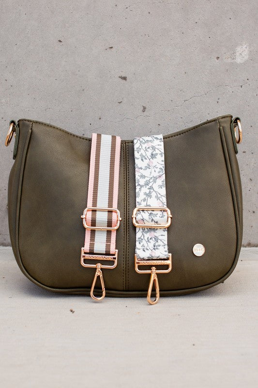 Marissa Crossbody Saddle Bag with Interchangeable Strap Set. Vegan leather bag with gold hardware and interchangeable straps.