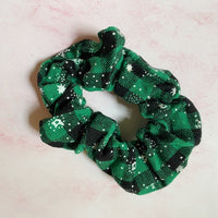 Merry Plaid Scrunchies, Pack of 4-Brighten up your holiday wardrobe with the Merry Plaid Scrunchies, Featuring four different colors and patterns. Perfect for a festive gift or stocking stuffer.
