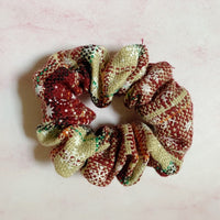 Merry Plaid Scrunchies, Pack of 4-Brighten up your holiday wardrobe with the Merry Plaid Scrunchies, Featuring four different colors and patterns. Perfect for a festive gift or stocking stuffer.