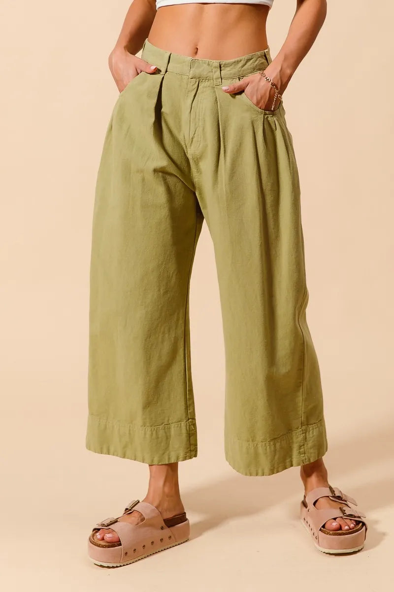 Shop Mid Rise Wide Leg Cropped Chino Pants-Relaxed olive green chino cropped pants with wide leg & drawstring waist. Lightweight cotton for summer comfort. Perfect for casual days & effortless styling.-available at Reef Love online boho-chic boutique