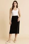 Midi Pencil Skirt with Contrast Piping Detail-This sophisticated black midi pencil skirt features a striking white piping detail that runs along the side, creating a sleek and modern contrast with stretch.-Reef Love