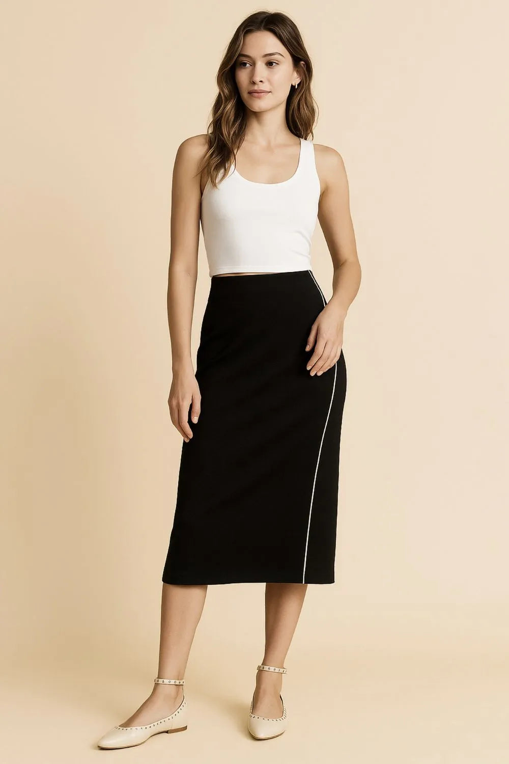 Midi Pencil Skirt with Contrast Piping Detail-This sophisticated black midi pencil skirt features a striking white piping detail that runs along the side, creating a sleek and modern contrast with stretch.-Reef Love