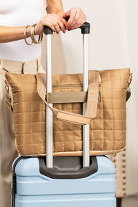 Quilted Traveler Tote with matching clutch. Oversized nylon tote with laptop sleeve & luggage strap. Great for work or travel
