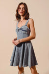 Mineral Washed Bow Ribbon Denim Flare Dress-Mineral washed denim flare dress with bow ribbon detail. Flattering silhouette with vintage vibes—perfect for casual days, brunch, or weekend outings.-Reef Love Boho-Chic Boutique