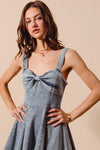 Mineral Washed Bow Ribbon Denim Flare Dress-Mineral washed denim flare dress with bow ribbon detail. Flattering silhouette with vintage vibes—perfect for casual days, brunch, or weekend outings.-Reef Love Boho-Chic Boutique
