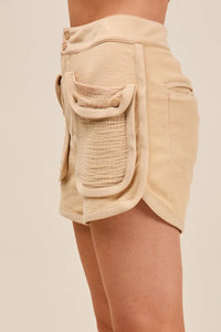 Shop Mineral Washed Terry High Rise Cargo Shorts-High rise cargo shorts with utility pockets in mineral-washed beige. Soft cotton blend, relaxed fit—perfect for casual summer looks and everyday comfort.-available at Reef Love online boho-chic boutique